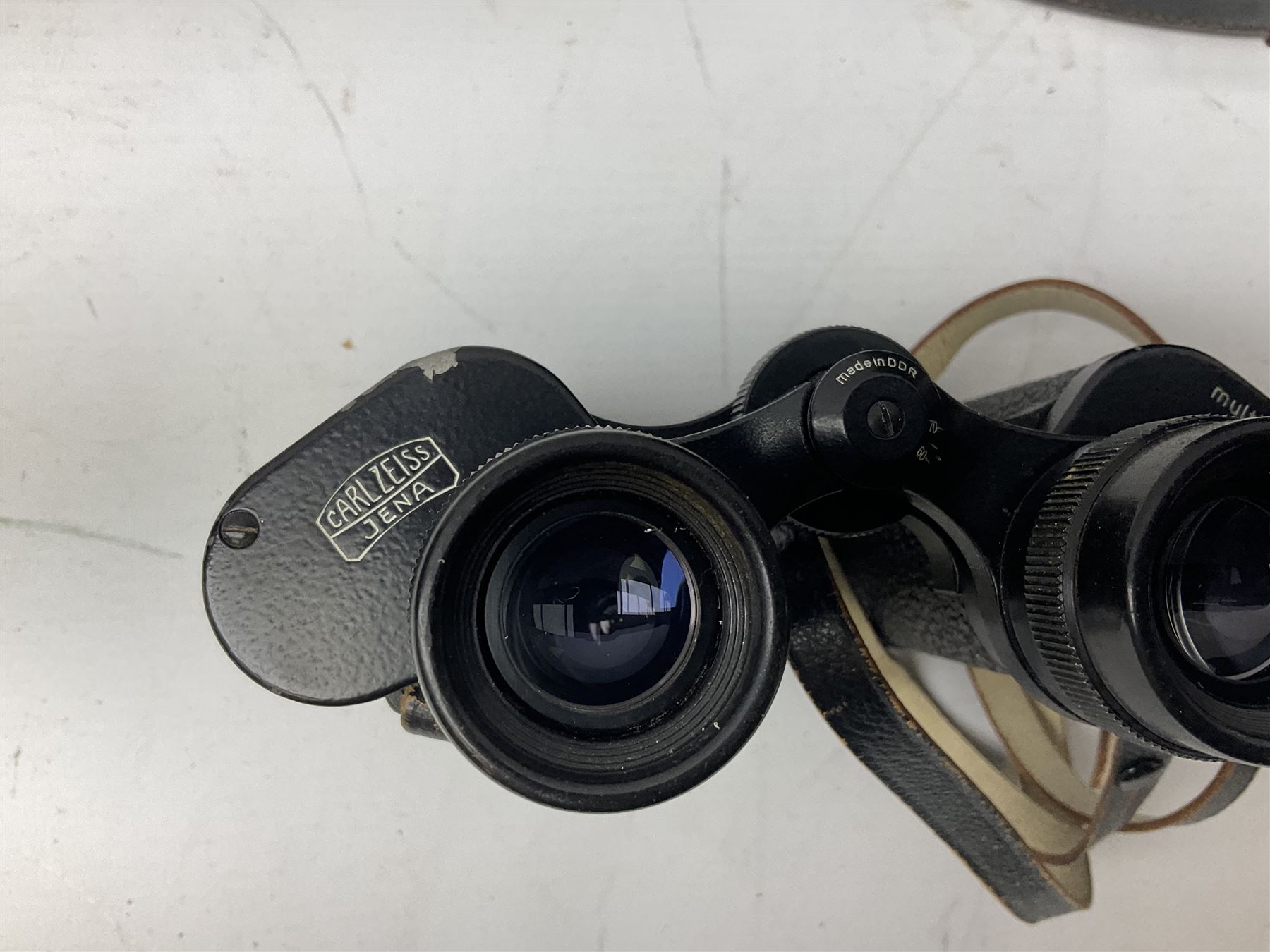 Three pairs of Carl Zeiss Jena binoculars, Jenoptem 10x50W, Jenoptem 8x30W and Jenoptem 10x50, all cased (3)