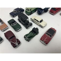 Over forty 1:76 scale die-cast models of cars and commercial vehicles; some boxed; and eight small scale models of motorcycles; all unboxed