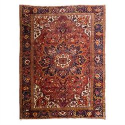 North West Persian Ahar hand-knotted carpet, red field with large central angular star med...