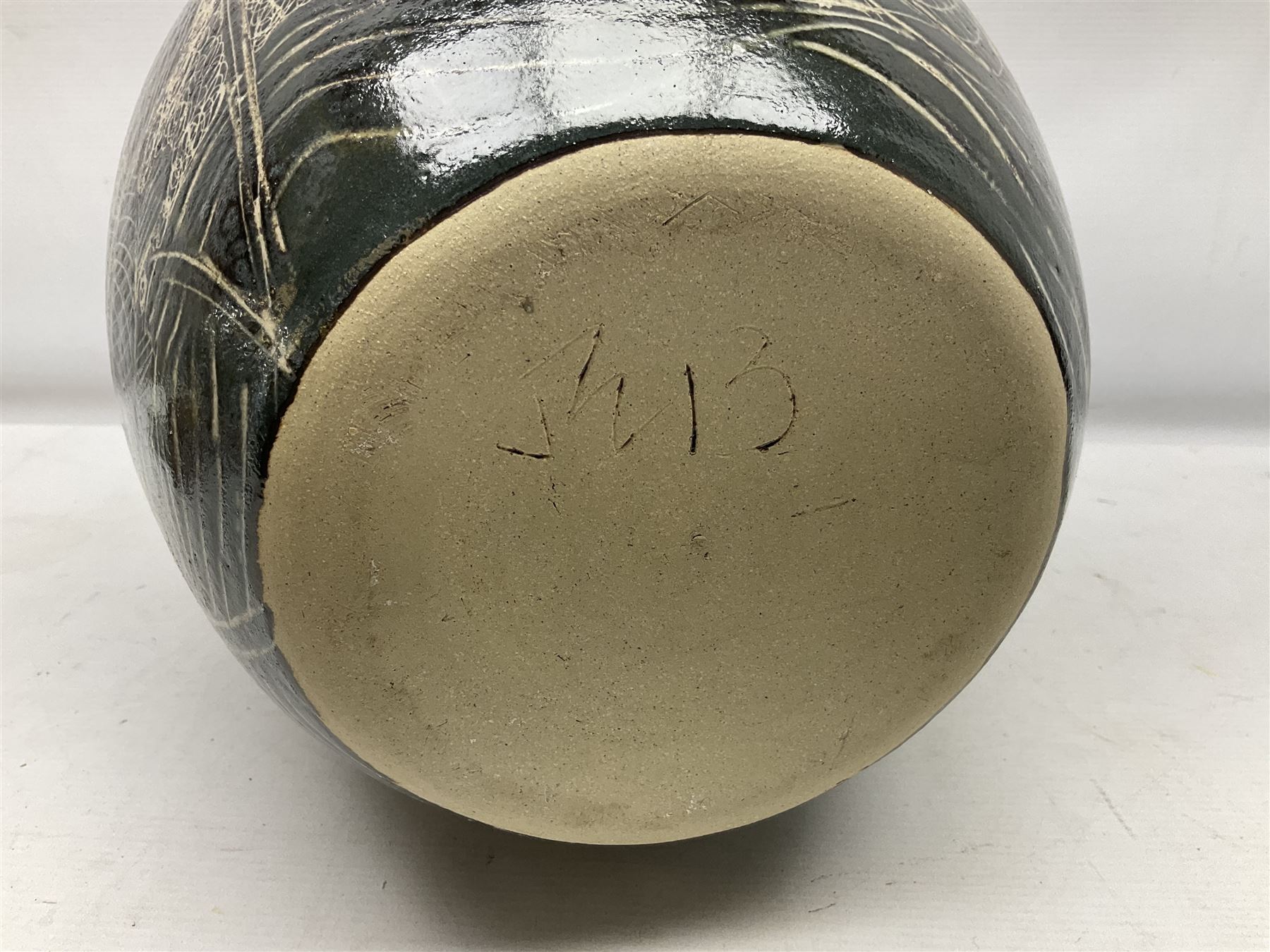 John Egerton (c1945-): studio pottery stoneware vase decorated with fish, mermaids and ammonites, H38cm