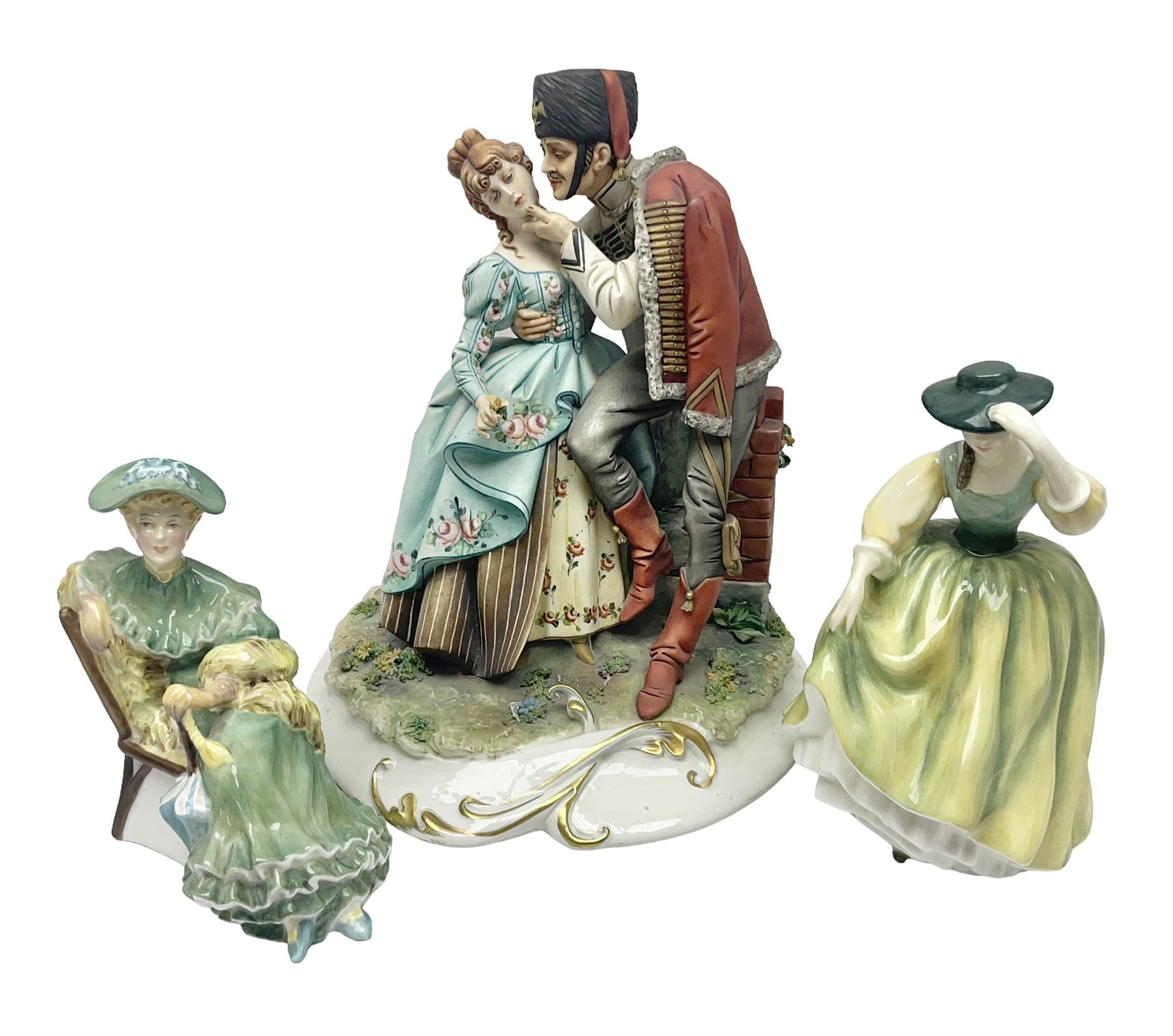 Two Royal Doulton figures, Buttercup HN2309 and Ascot HN2356, together with Capodimonte figure Hussar and His Lady 