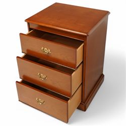 Stag - 'Carolina Cherry' three drawer chest (L 84cm, D 43cm, H 72cm); tall pedestal chest with hinged mirror top(L 53cm, D 43cm, H 104cm); bedside chest (L 53cm, D 43cm, H 72cm)