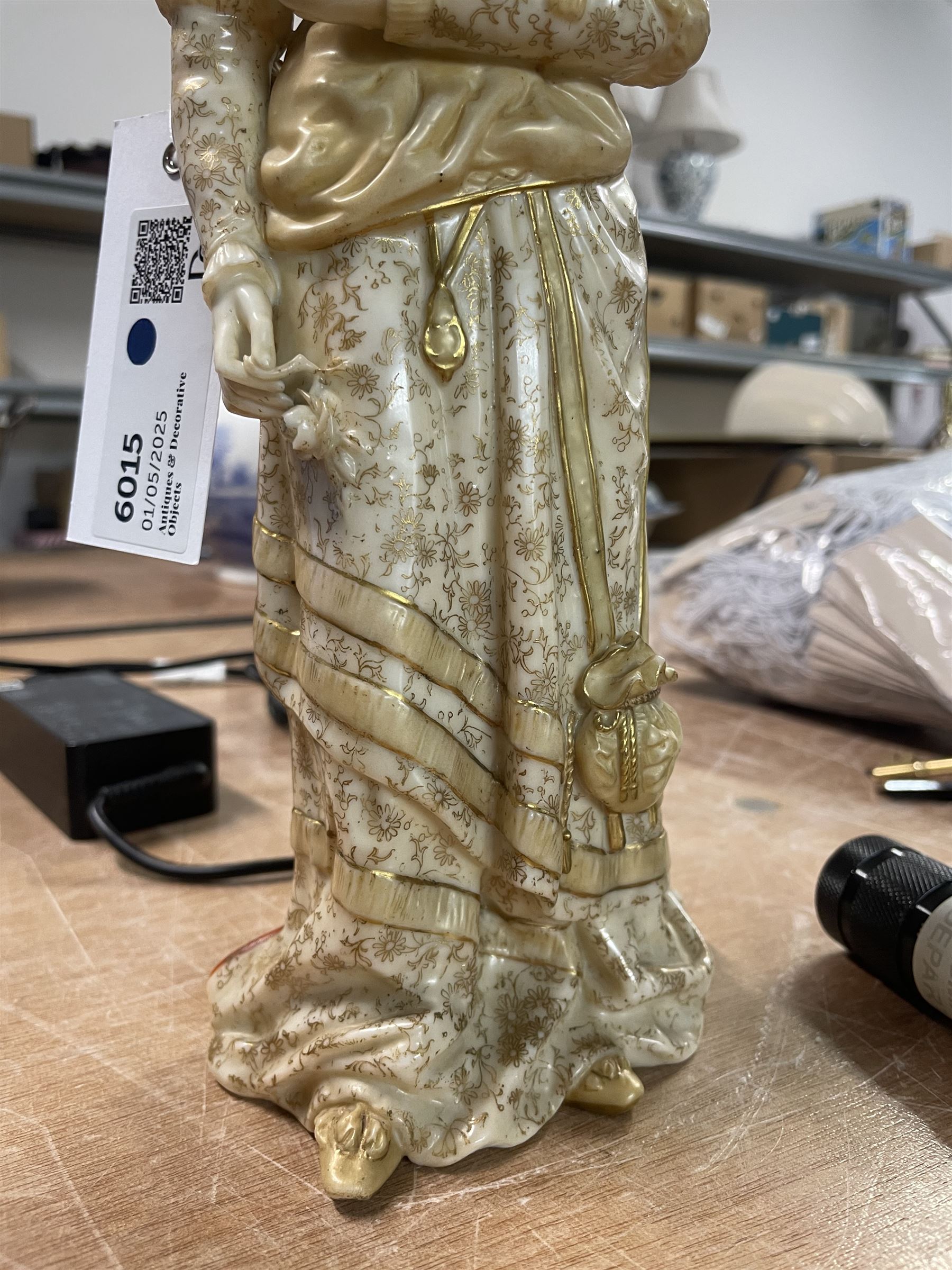 Doulton Burslem 'Mephistopheles and Marguerite' Vellum double-sided figure, the obverse formed as a smiling demon, the reverse formed as a woman with a book and flower, decorated in orange and gilt to one side and in gilt to the other, printed green mark to base, H30cm 