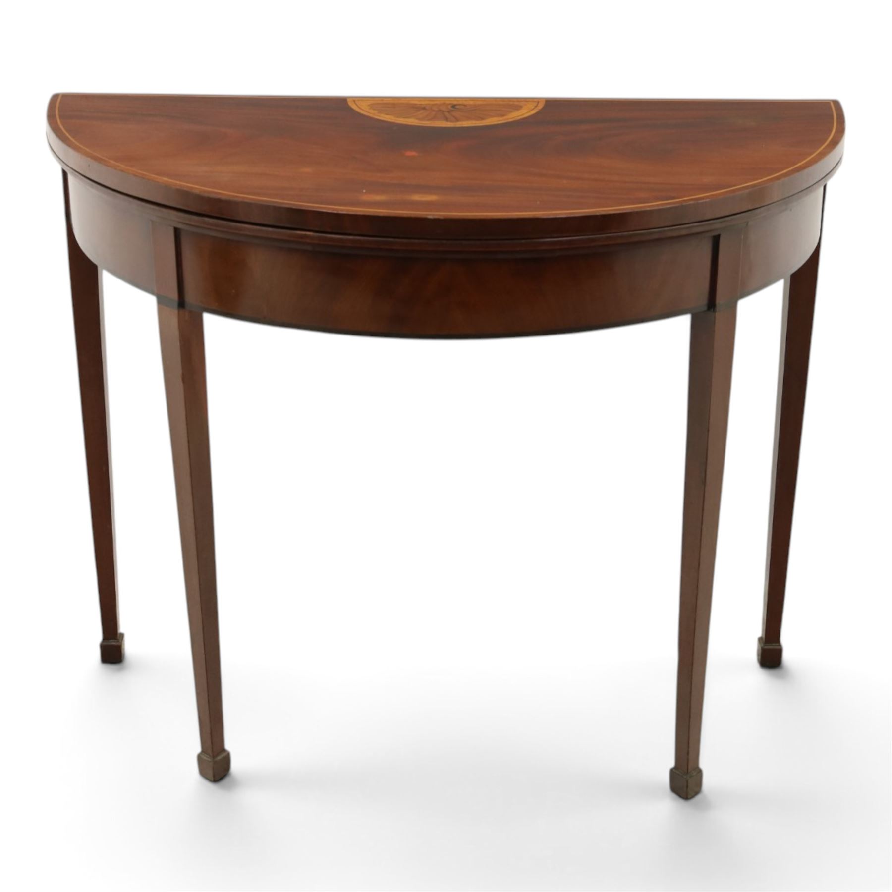 Edwardian mahogany inlaid demi-lune side table, inlaid top with shell motif, green baize interior, with gateleg, raised on square tapering supports terminating in spade feet