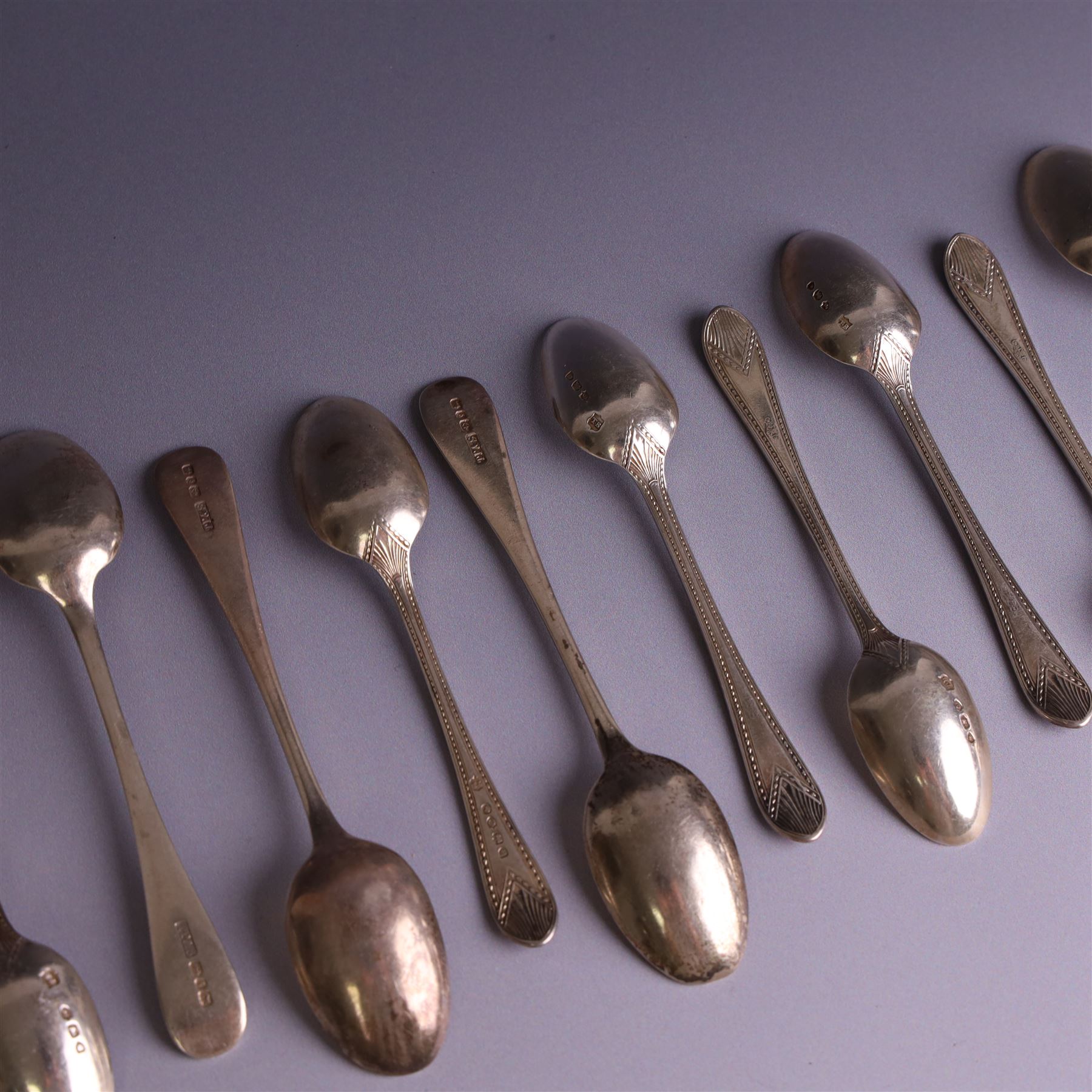 Set of ten silver late Victorian silver teaspoons, with beaded rimg and engraved fan design, hallmarked Thomas Bradbury & Sons, London 1891, and a set of five Victorian silver teaspoons with beaded rim, hallmarked Thomas Prime & Son, Birmingham 1890