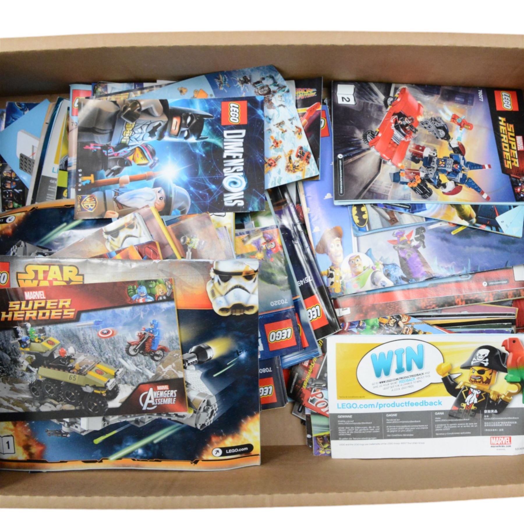 Quantity of loose Lego from various kits, together with a collection of Lego instruction booklets for various sets, including Marvel, Star Wars, DC Comics Dr Who, etc 