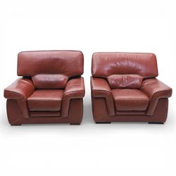 Fabrizio Mantellassi - 20th century Italian red leather suite, one three seat and two large armchairs, upholstered in deep red hide with stitched seam detailing, with magazine pockets to each side, the rectangular back cushions above broad padded arms and seat cushions, raised on low block bases

Sofa: H c98m, W 203cm, D 92cm
Armchair: H 98cm, W 113cm, D 92cm