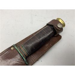 WW2 fighting knife, the 17cm double edged blade marked Taylor 'Eye' Witness Sheffield, with brass crosspiece and pommel and leather bound grip, in leather scabbard L30cm overall; pair of Carl Zeiss Jena binoculars inscribed 'J.J. White 85th L.Y.', in leather case; and quantity of cap badges, buttons etc including Royal Canadian Navy, Royal Artillery, Royal Engineers, Royal Armoured Corps, Lancers etc