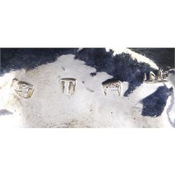 Georgian toddy ladle with silver tapering oval bowl and later turned wooden handle, engraved with initials to underside of bowl, hallmarked London, probably 1734, maker's mark indistinct, H39cm, together with two Georgian toddy ladles with silver bowls and baleen twist handles, the first example with circular bowl marked CB, H35.5cm, the second example with oval bowl and spout, unmarked but testing as silver, H35.5cm