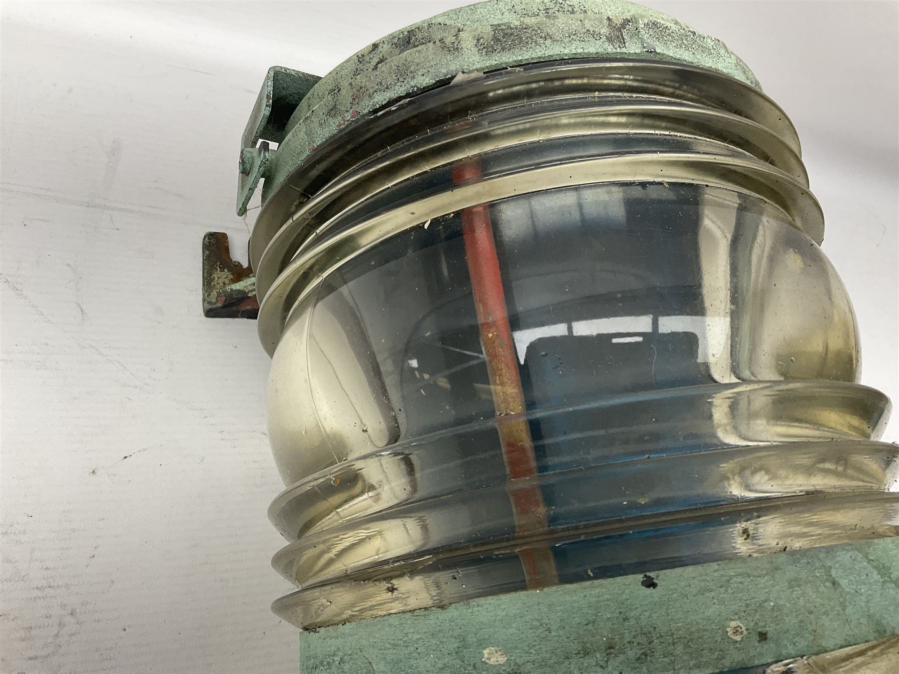 Two port and starboard brass lamps, each with a plaque marked 'Noack as Lanterne KL.A Serie 700 Type 704D Babord', ribbed green and red glass shades, H44cm