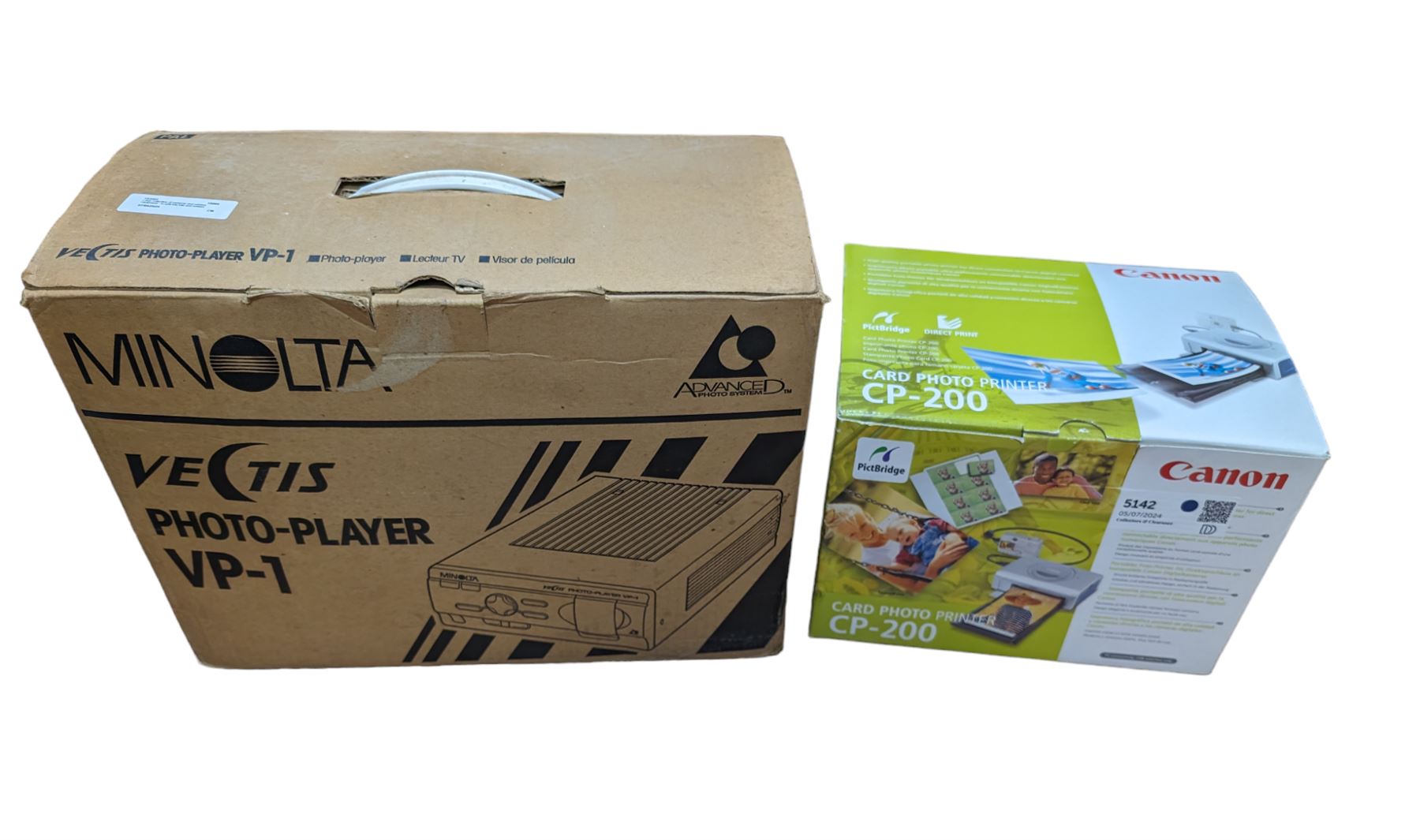Minolta Vectis photo player VP1 and a Canon card photo printer CP-200, both boxed 