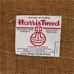 Tetrad - 'Taransay' Harris Tweed and tan leather club armchair, Howard shape with reclined back over deep seat and rolled arms with studwork, raised on turned front supports with castors, the sides and arms upholstered in tan leather with seat and back in herringbone-stitched Harris Tweed