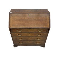 Georgian oak and mahogany banded bureau, fitted with fall front revealing fitted interior, above four graduating drawers
