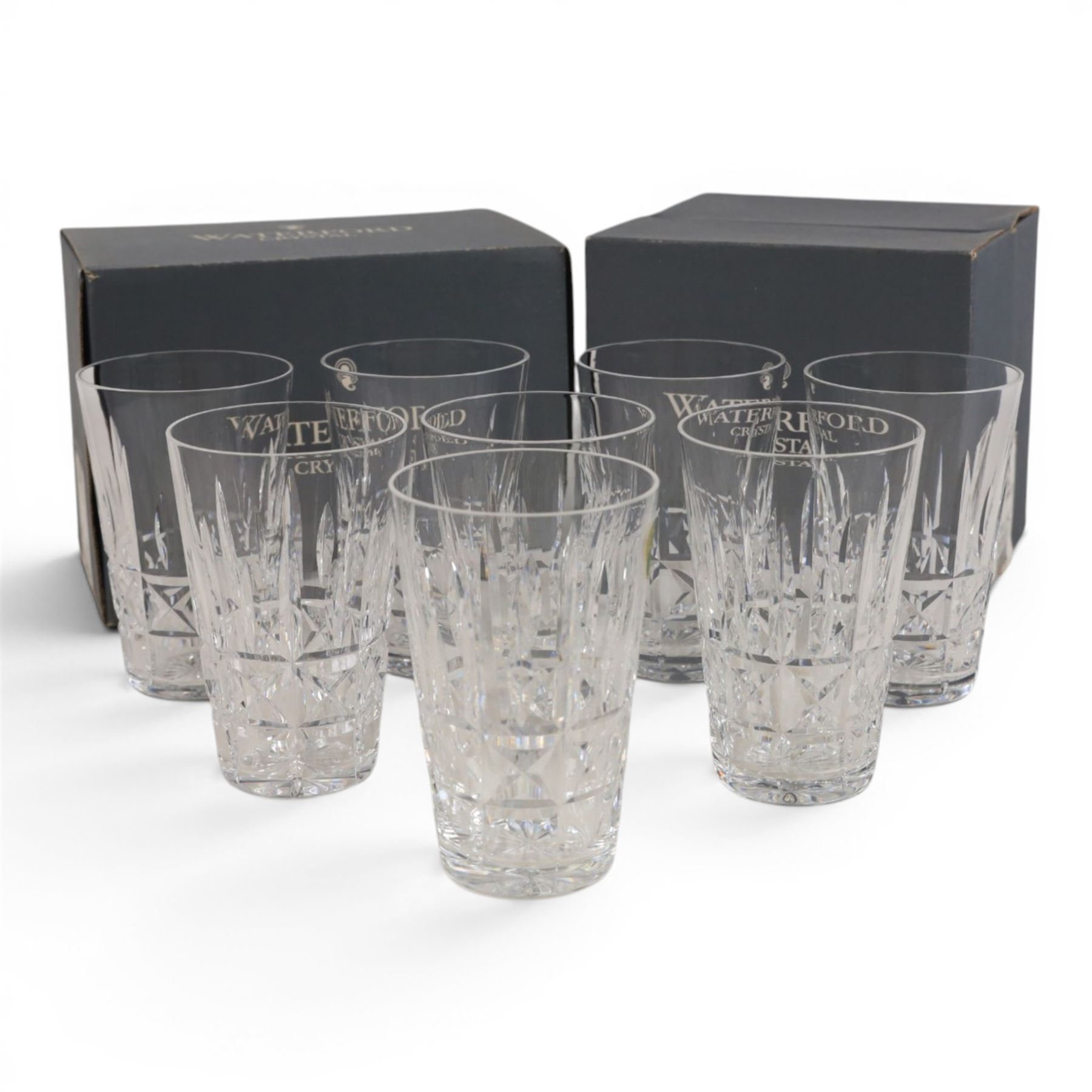 Set of twelve Waterford Crystal Kylemore pattern tumblers and matching jug, tumblers H13cm