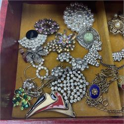 Charm bracelet with some silver charms, together with a collection of costume jewellery, including brooches, within jewellery case 
