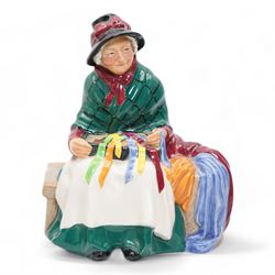 Four Royal Doulton figures comprising 'Sweet Lavender' HN1373, 'The Balloon Seller' HN583, 'Biddy Pennyfarthing' HN1843 and 'Silks and Ribbons' HN2017 (4)