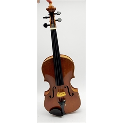 Late 19th century violin with 36cm maple back and spruce top, bears label 'Copy George Klotz Made in 1747', L59cm overall, in ebonised wooden carrying case with two bows  
