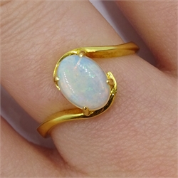 18ct gold oval opal ring, stamped 750