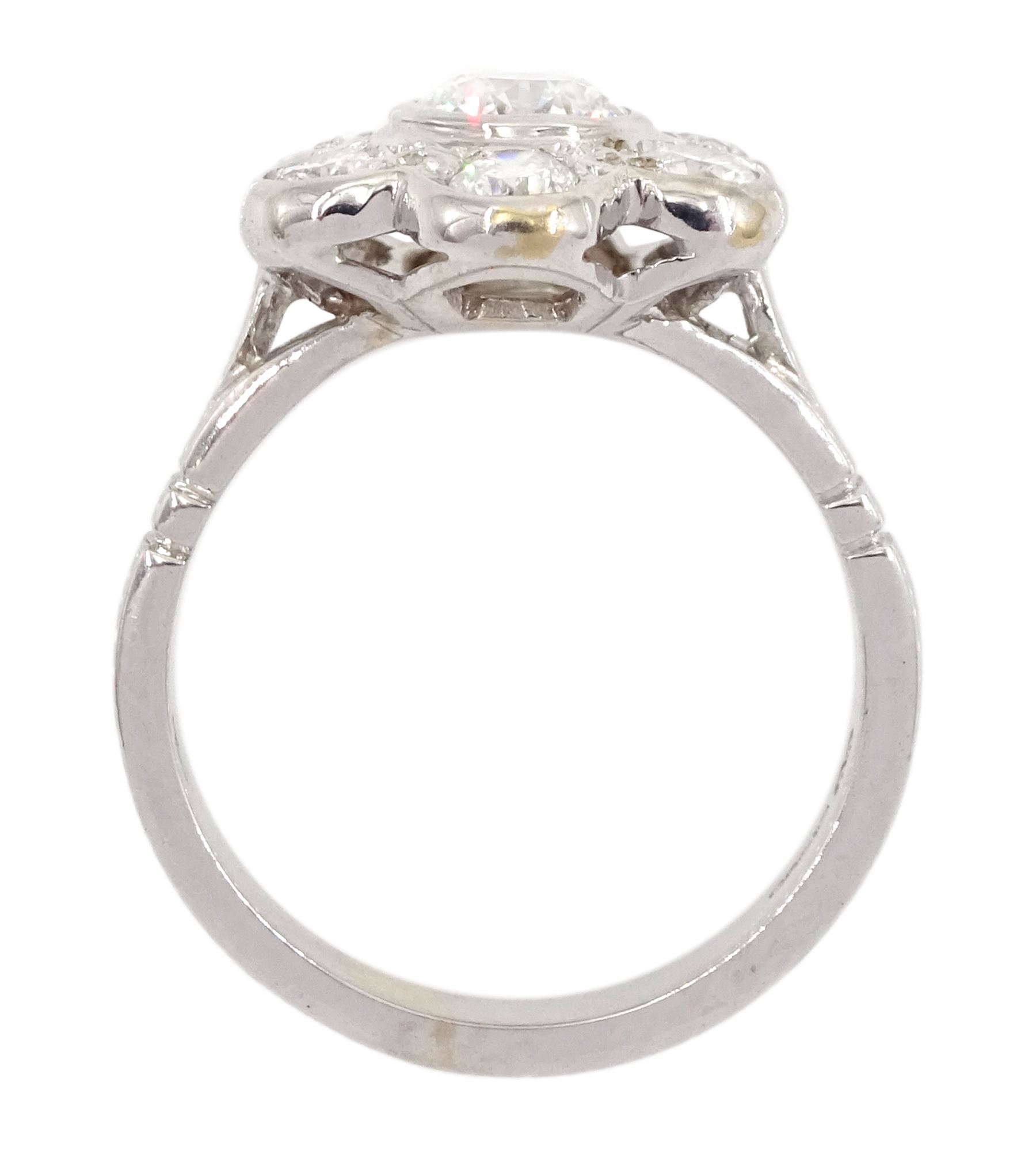 18ct white gold seven stone round brilliant cut diamond daisy flower head cluster ring, hallmarked, principal diamond 0.74 carat, with GIA report, total diamond weight approx 1.40 carat