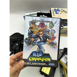 Eighteen Sega Mega Drive games, including Sonic The Hedgehog, Sonic The Hedgehog 2, Alienstorm, Desert Strike, Fatal Rewind, Road Rash etc, all boxed, together with a Sega Mega Drive controller, cartridge converter and an arcade power stick controller