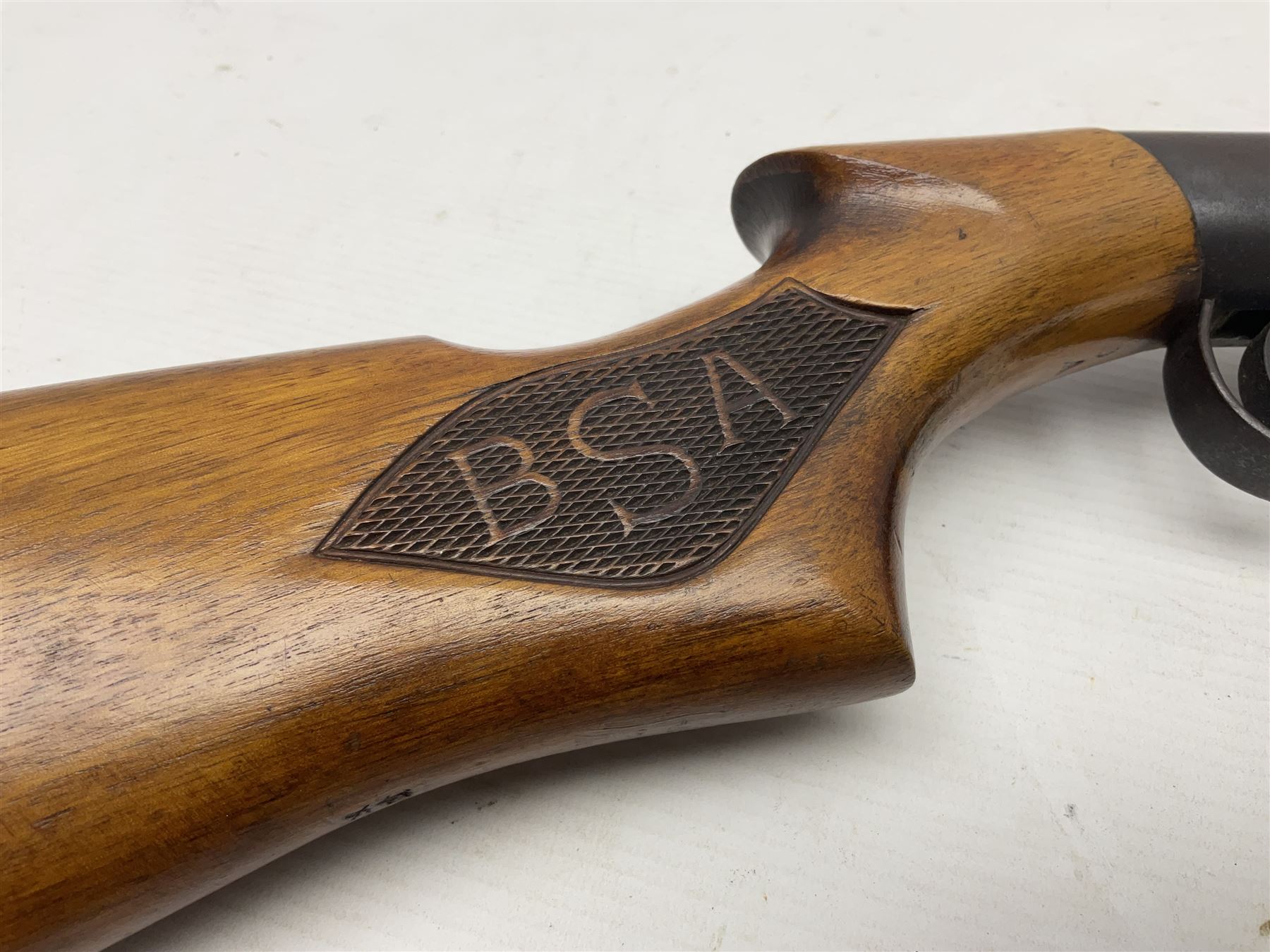 Early 20th century BSA Standard .177 Cal. Air Rifle (No.1), early A prefix number A67, with blued finish, top-loading, push-button underlever action, walnut semi-pistol grip stock with chequered BSA logo L101cm overall; with contemporary canvas case; NB: AGE RESTRICTIONS APPLY TO THE PURCHASE OF AIR WEAPONS.