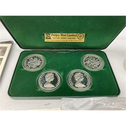 Coins and medallions, including ten Queen Elizabeth II five pound coins, in folders, covers or on cards, United Kingdom 1983 uncirculated coin collection, Isle of Man one pound coins, Van Gough commemorative medallion etc