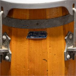 Three conga drums, comprising two Excelsior A. Salvadori Firenze stave-built wooden congas and one similar French example, with skin heads and metal tension mounts, on metal stands with hard carry cases for drums, tallest H79cm, D31cm