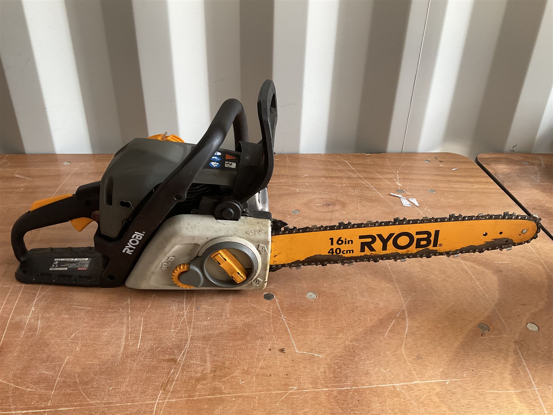 Ryobi petrol chainsaw with helmet, face shield and gloves - THIS LOT IS TO BE COLLECTED BY APPOINTMENT FROM DUGGLEBY STORAGE, GREAT HILL, EASTFIELD, SCARBOROUGH, YO11 3TX