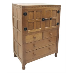 'Mouseman' panelled oak tallboy, panels and frame adzed, double cupboard above two short and two long drawers, by Robert Thompson of Kilburn, W85cm, H124cm, D49cm