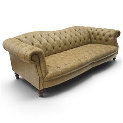 Tetrad - 'Matisse' grande three-seat sofa, Chesterfield shape with rolled arms flanking a serpentine back and front, upholstered in buttoned tan leather with close-nailed studwork, on turned feet