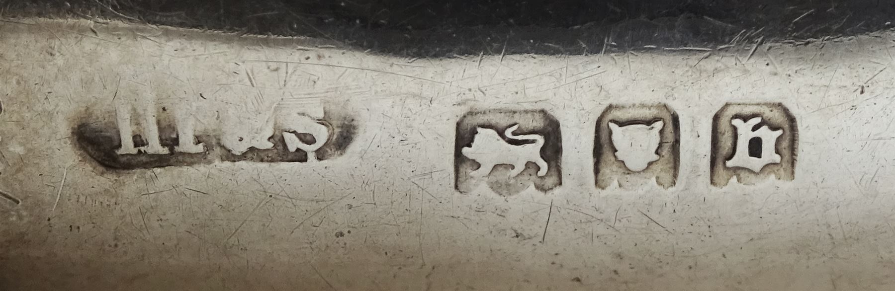 Edwardian silver sovereign holder by A & J Zimmerman Ltd,  Birmingham 1902, silver whistle by John Bettridge, Birmingham 1824, pair of silver knife rests by Josiah Williams & Co, London 1919, silver cheroot holder, Victorian 1889 silver crown, pill box and a silver Middle Eastern embossed mount