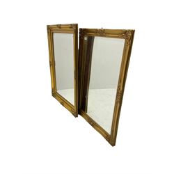 Near pair gilt mirrors, rectangular bevelled plate, framed moulded with foliate decoration