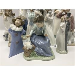 Eleven Nao figures to include Cowboy, Girl with Puppy, Clown, Girl in hat etc 