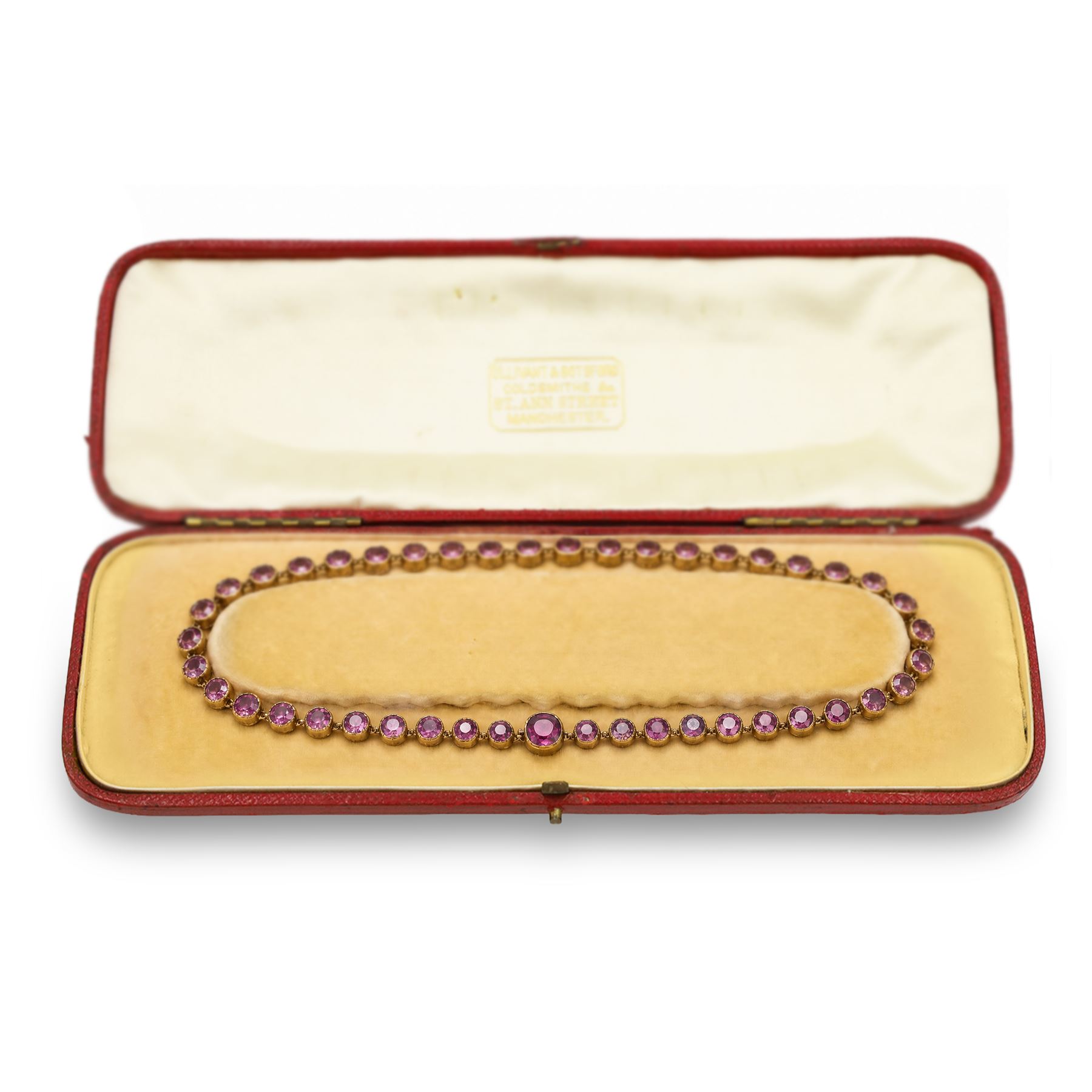 19th century gold garnet rivière necklace, set with forty-four graduating cushion cut rhodolite garnets (possibly doublets), in a velvet and silk lined case by Ollivant & Botsford, Manchester