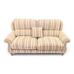 Parker Knoll - contemporary 'Henley' lounge suite comprising grande two seat sofa and wingback armchair, traditional wing shape over rolled arms and turned feet, upholstered in striped fabric