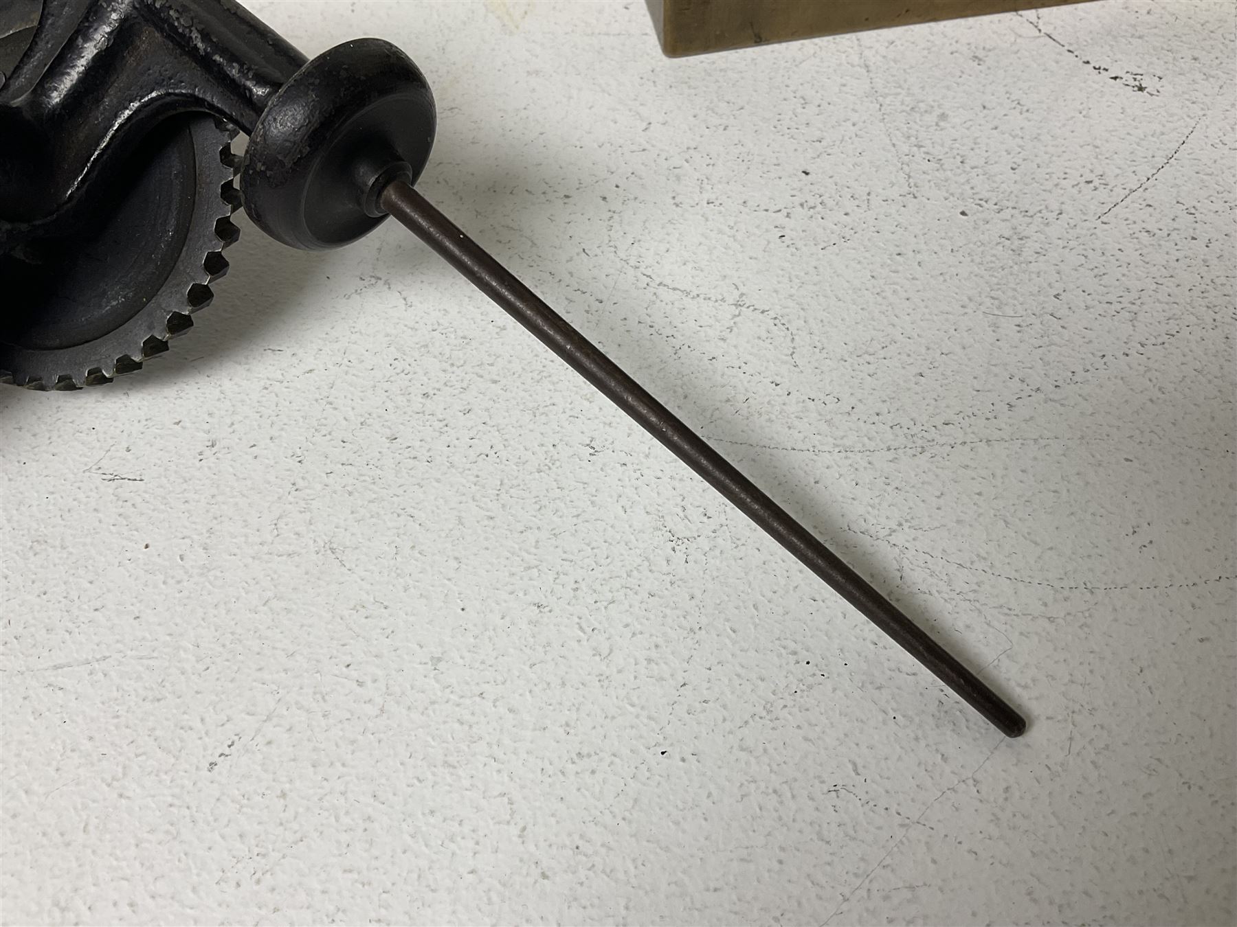 Cambridge Scientific Instruments Co clinometer, flintlock tinder lighter, and a Anders Mattson Mora patent bobbin winder (3)