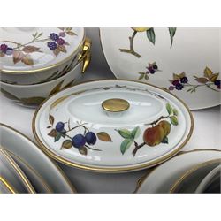 Royal Worcester Evesham pattern, including covered pot de cremes, twin handle tureen, serving dishes, flan dishes, side plates etc  
