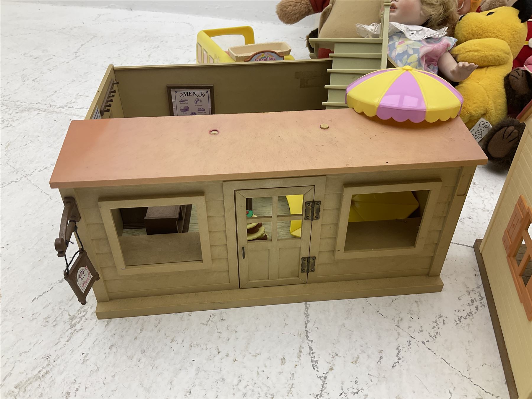 Quantity of stuffed toys and dolls to include Teddy Ruxpin, Cabbage Patch, Troll doll, and a quantity of plastic toys including Sylvanian Families Country School etc, in two boxes