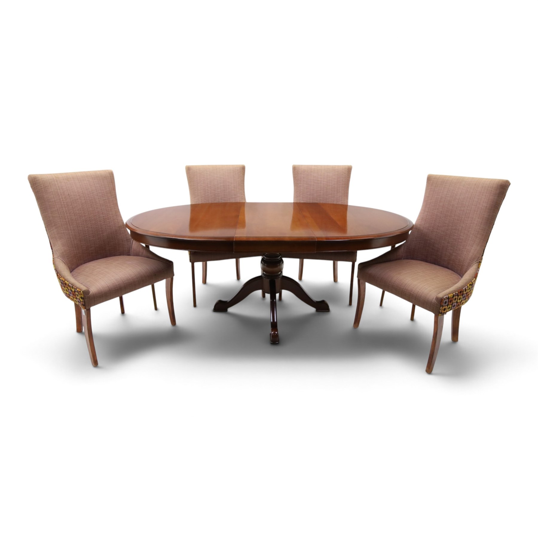 Barker & Stonehouse - cherrywood oval extending dining table and four upholstered chairs, the table with additional leaf extended to cm, raised on a turned column above swept supports, the chairs with brown upholstery and multi-coloured geometric design