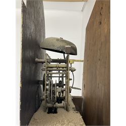 John Bancroft of Scarborough - oak cased thirty-hour longcase clock c1800, swans neck pediment with a recessed break arch door flanked by two pilasters with capitals, trunk with canted corners and long trunk door with a wavy top, rectangular plinth on bracket feet, painted dial with Roman numerals and five minute Arabic’s, matching steel hands and calendar aperture, floral spandrels and conforming artwork to the break arch, chain driven count wheel movement striking the hours on a cast bell. With pendulum and weight.