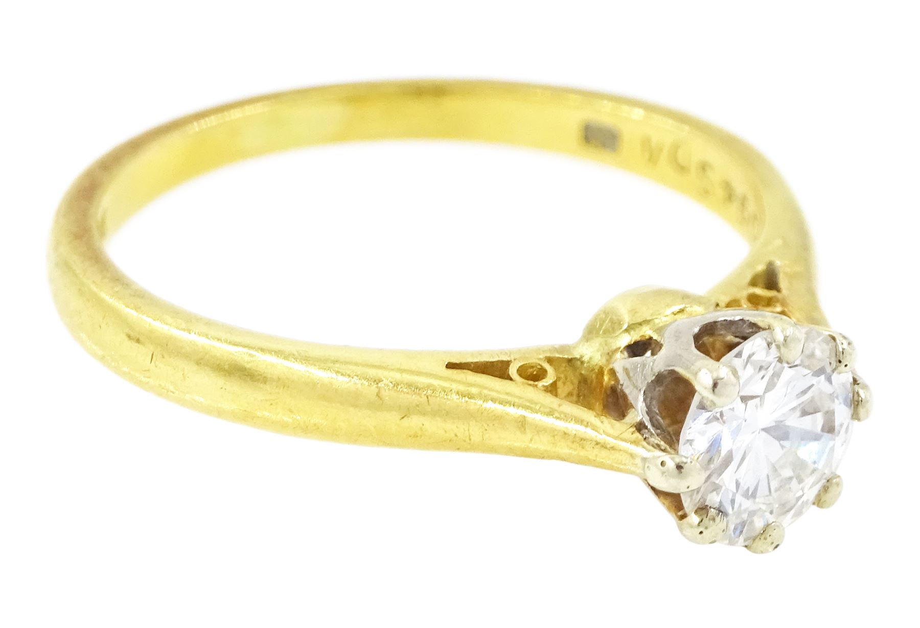 18ct gold diamond ring, eight claw set with a single round brilliant cut diamond of 0.49 carat, London 1973