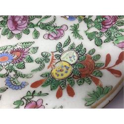 Three Chinese celadon plates decorated in the Famille Rose palette with enamelled birds, peonies and butterflies, each with seal mark to the base, approx D18cm