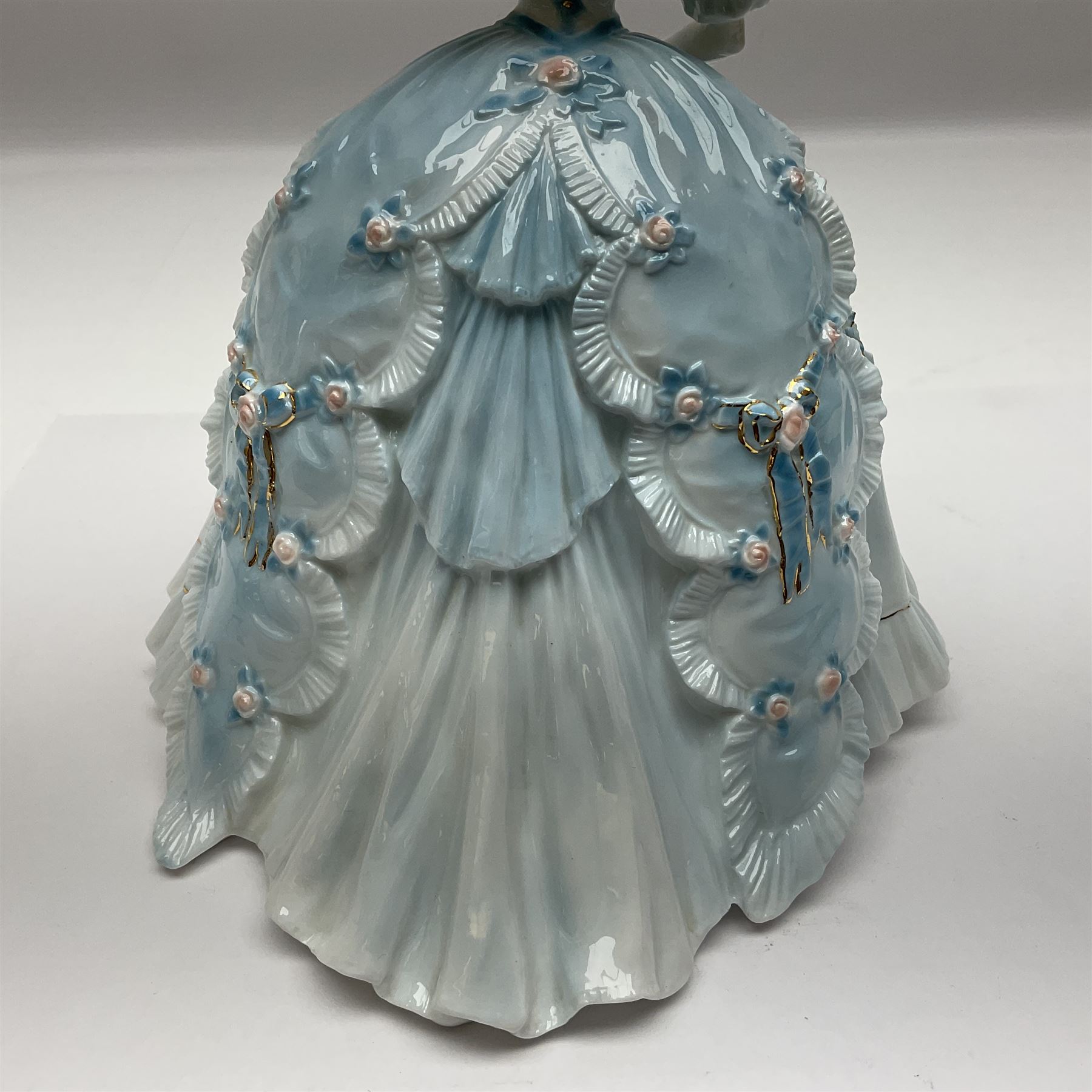 Three Royal Worcester figurines,  The First Quadrille, The Fairest Rose and Queen of Hearts, largest H21cm