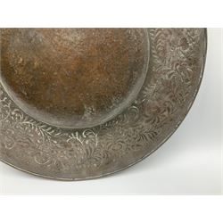 Arts and Crafts Keswick School of Industrial Arts copper charger, decorated with planished centre and repousse scrolling foliate tendrils to rim, D44cm
