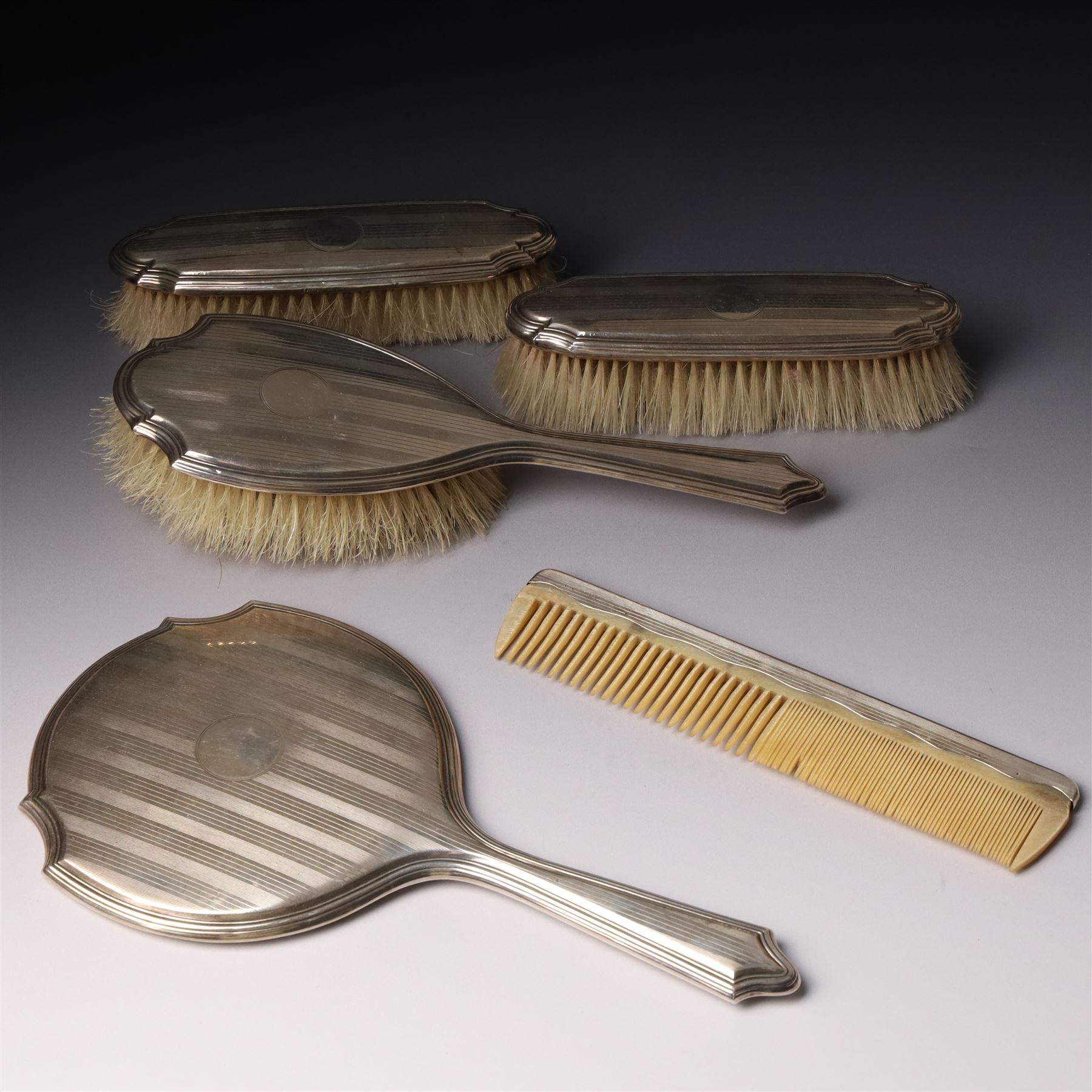 Five piece engine turned silver backed dressing table set Birmingham 1923/24 Maker Docker & Burn Ltd