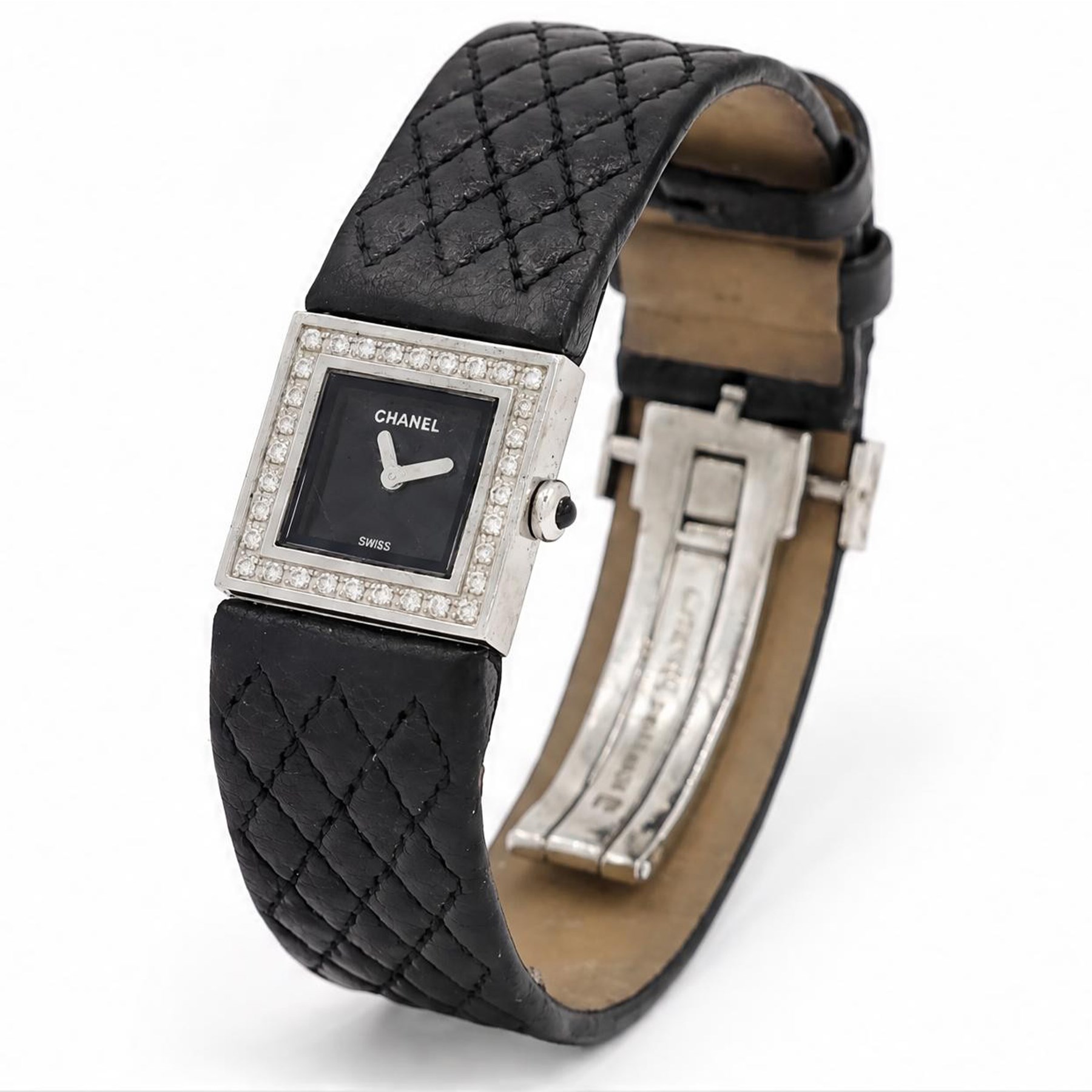 Chanel Matelassé ladies diamond stainless steel quartz wristwatch, black quilted dial, with round brilliant cut diamond bezel, back case No. 77835 and dated 2003, on quilted leather strap with fold-over-clasp 