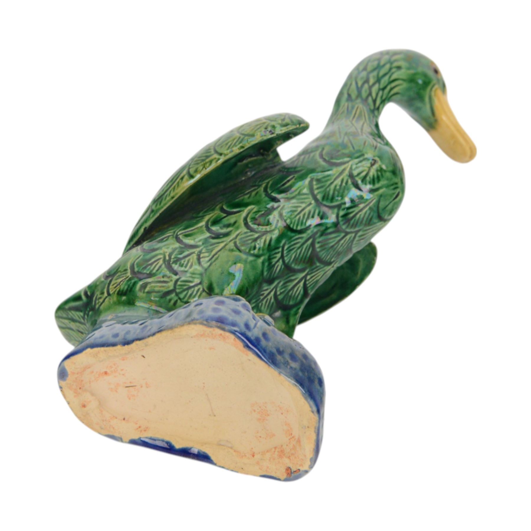 Pair of 20th century Chinese standing ducks, standing on a mottled base, H20cm