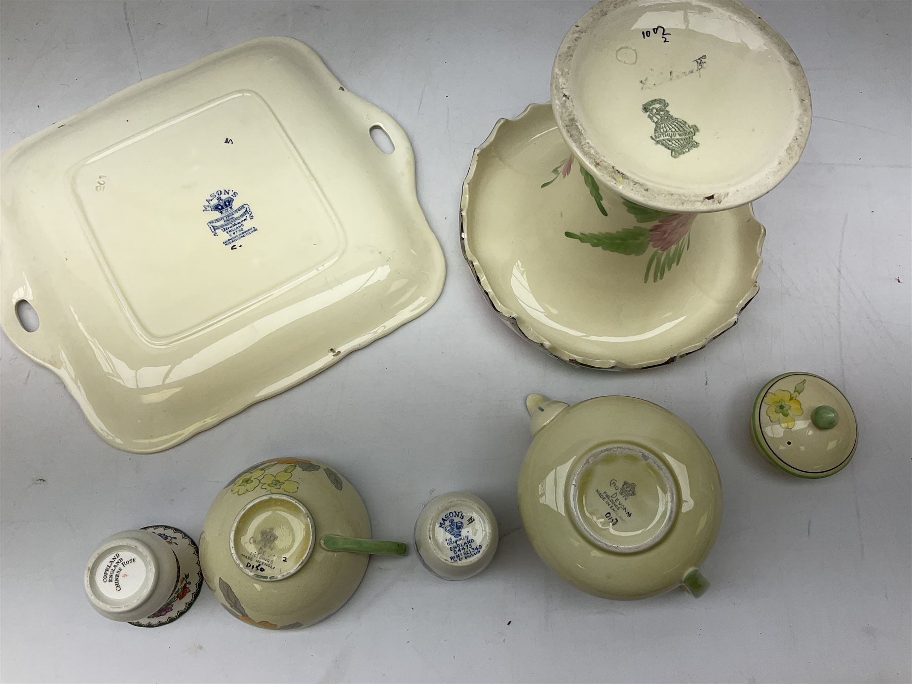 Group of ceramics to include Art Deco examples, Arthur Wood twin handled vase decorated in the Garden Wall pattern, Art Deco style Coalport twin handled lidded sucrier and saucer, Mason's Applique jug (scratch through mark), Royal Doulton Minden bowl and jug, Copeland Spode Royal Jasmine jug, Crown Devon, etc
