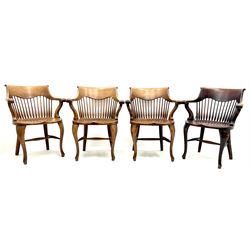 Set eight early 20th century oak captains chairs, carved scrolling cresting rail, tapering stick back, cabriole legs joined by stretchers 