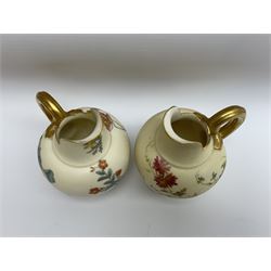 Two Royal Worcester blush ivory jugs, each decorated with flowers, shape number 1094 